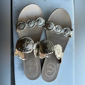 Gold Jack Rogers women’s sandals. Worn a few times. Love them, just fit snug.
